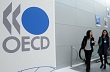 OECD quyết định hạ dự báo tăng trưởng kinh tế toàn cầu 